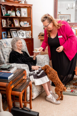 An aged care worker in Perth assists a client