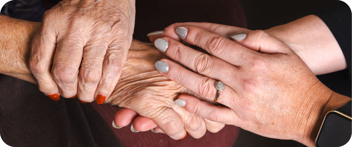 A photo of hands holding.