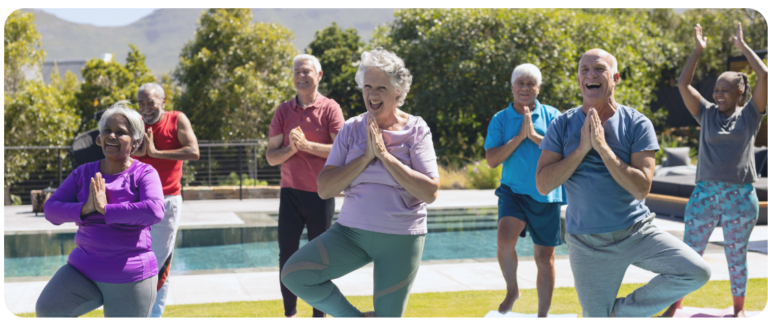 A photo of a group of older Australians enjoying an outdoor fitness class for seniors in Melbourne. 