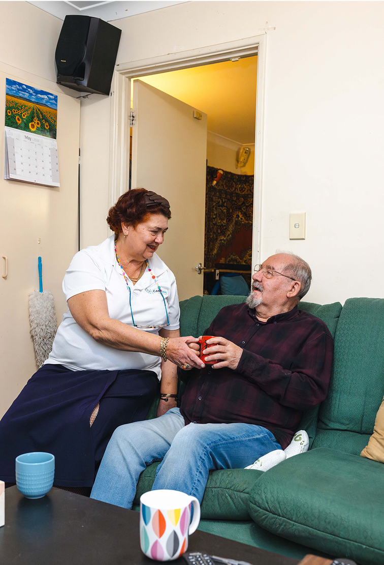 A photo of a caregiver from The CareSide assisting a client with home care services in Geelong.