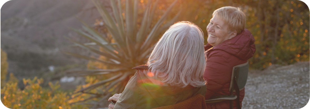 A photo of two older Australians enjoying the outdoors, which is one of the best activities for seniors in Brisbane.