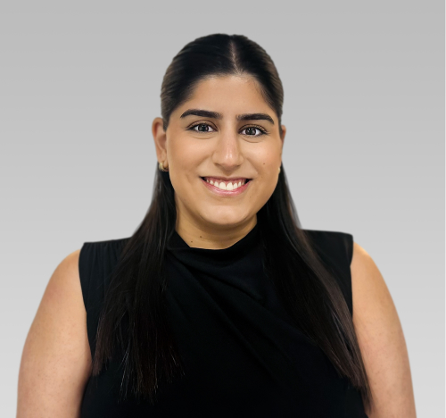 Maha, a Care Manager at The CareSide, smiles for a photo.