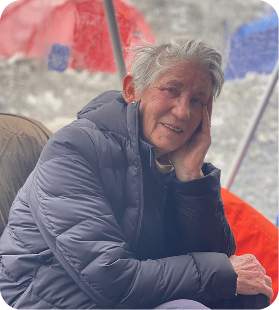 Trekker Carolyn Robinson smiles for a photo while climbing Mount Everest.
