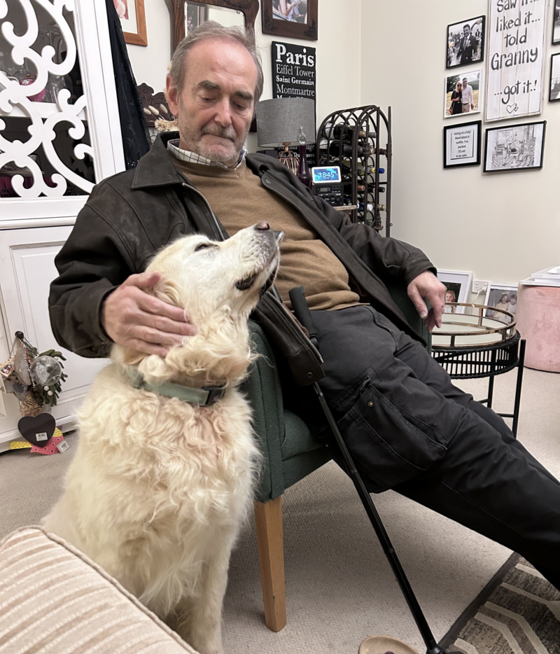 A photo of Michael and his dog, Gussie. Michael changed home care providers to The CareSide so he could have more continuity of care.