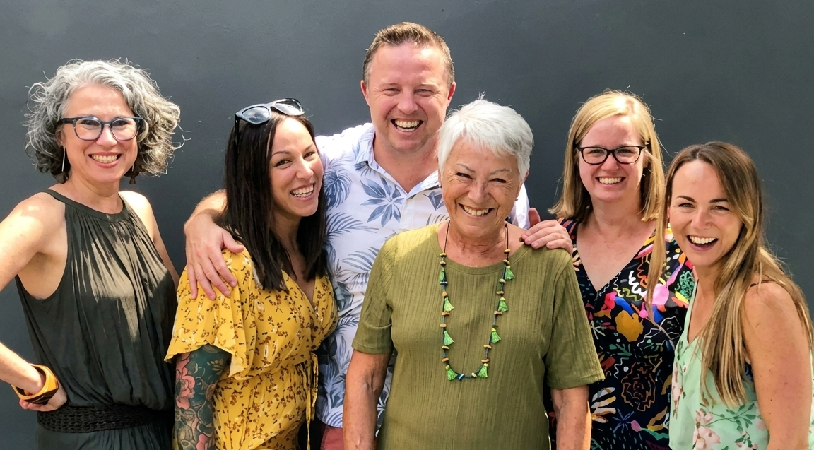 A photo of Jane with her five children. Jane decided to transfer home care services to The CareSide for continuity of care, consistent scheduling, and transparent Support at Home service pricing.